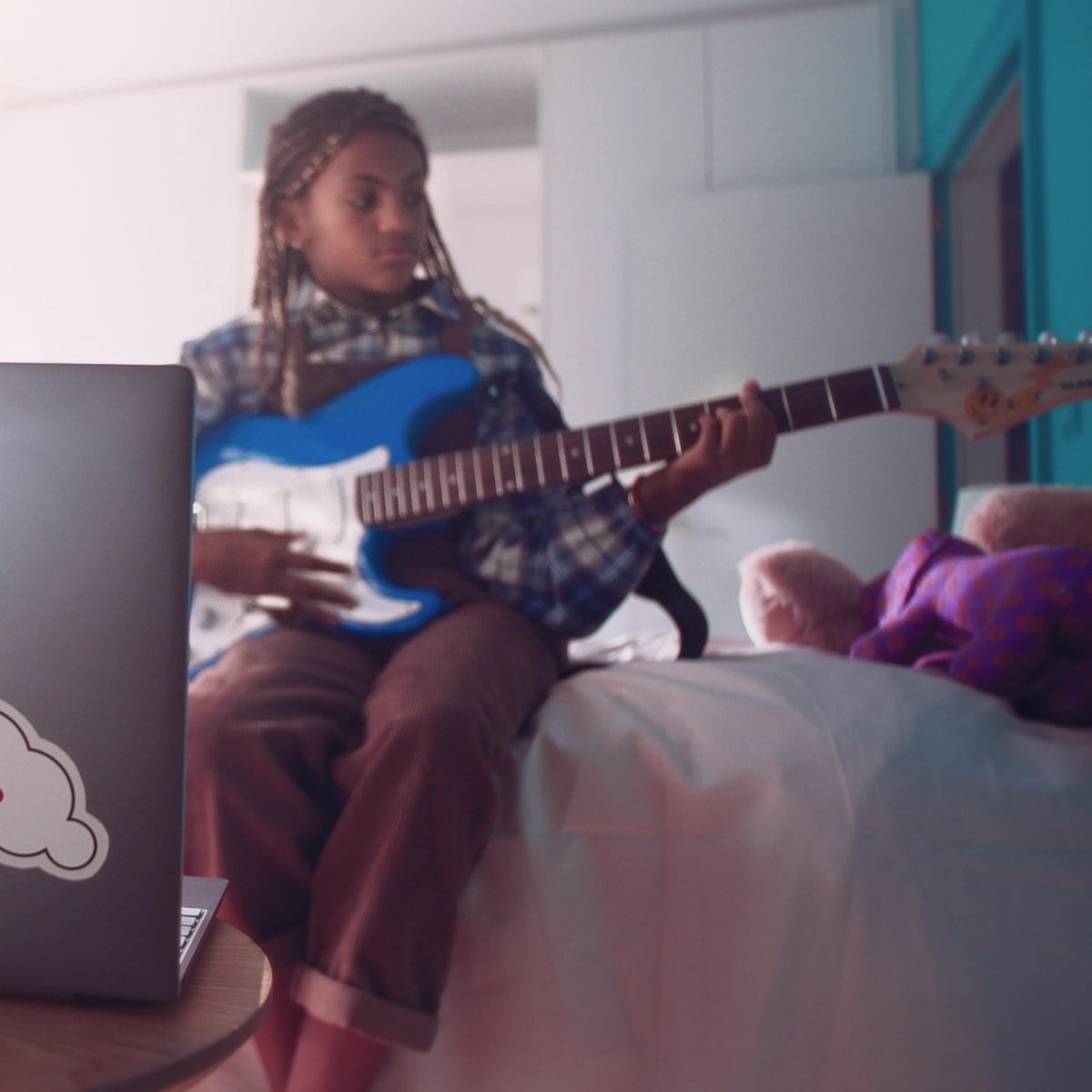 Dell laptop girl playing guitar